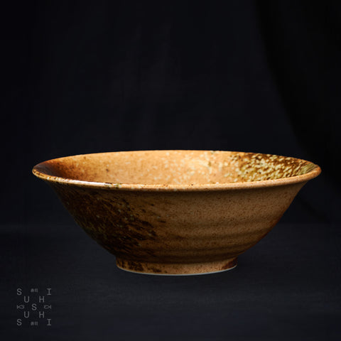 A Shiragaki Oribe Ramen Bowl on a Black Background