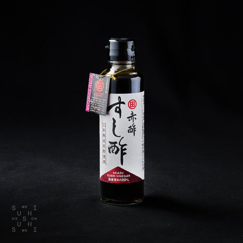 150ml Bottle of Sweet Akasu Vinegar on a black background