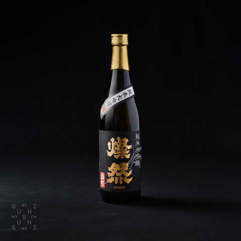 720ml bottle of Sanzen, Omachi Junmai Daiginjo on a black background
