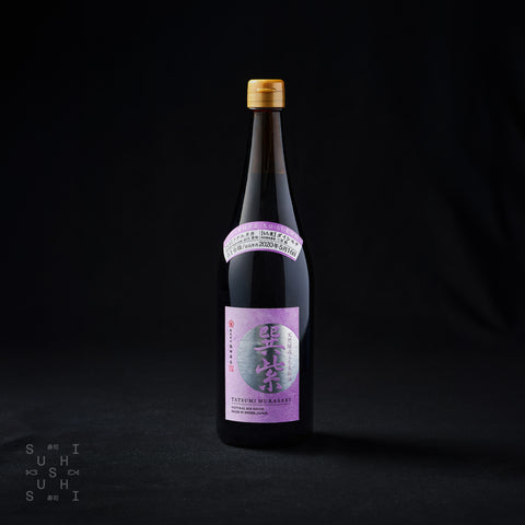 720ml bottle of Kajita, Ultimate Light Soy Sauce on a black background
