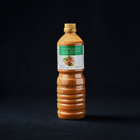 Bottle of Gluten Free Sesame Dressing on a black background
