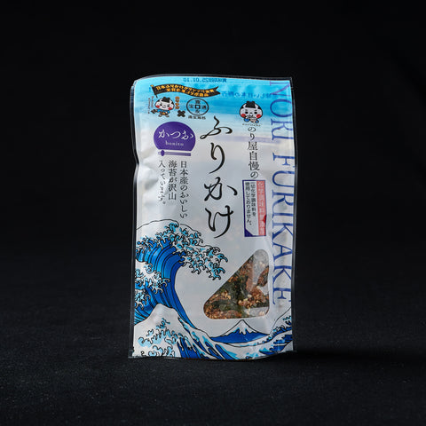 Packet of nori furikake on a black background