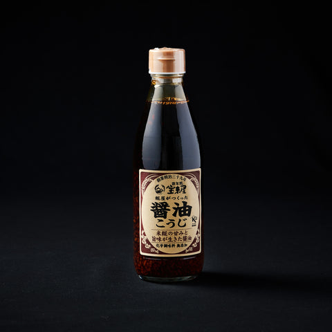 340ml bottle of Koji Soy Sauce on a black background
