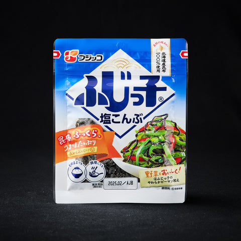 28g pack of salted shredded kombu on a black background