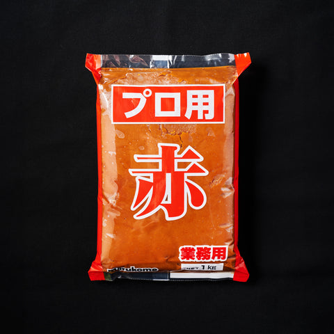 1Kg pouch of red miso on a black background