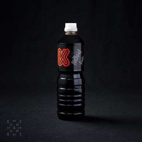 1l bottle of Komi Gluten Free Soy Sauce on a black background