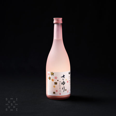 Pink 720ml bottle of Hakutsuru, Sayuri Nigori Sake on a black background