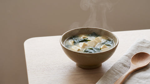 Gluten-free miso soup with tofu cubes and wakame seaweed