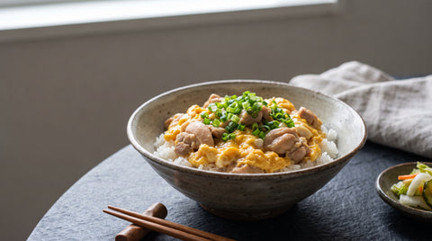 Authentic Japanese oyakodon bowl with chicken and egg over rice