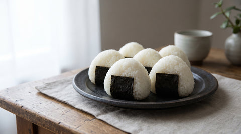 Soft round Japanese onigiri rice balls wrapped with nori