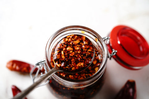 Jar of Momoya crispy chilli oil, known as la-yu or Chilli Crack