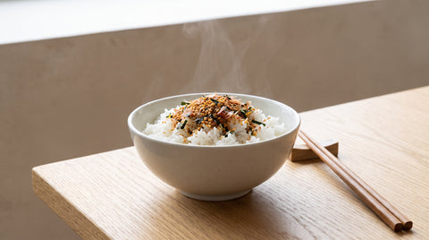 Bowl of steamed rice topped with colourful furikake seasoning