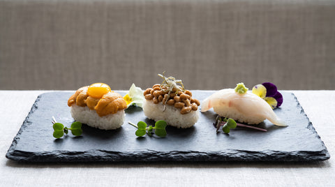 Unusual sushi ingredients including sea urchin and quail egg nigiri