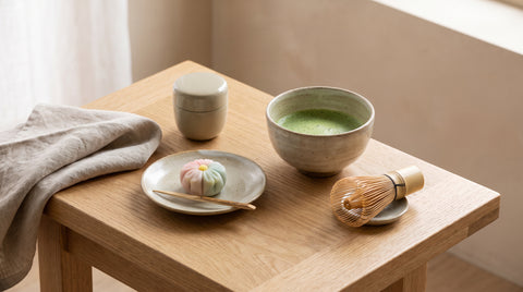 Japanese tea ceremony set with matcha bowl and bamboo whisk