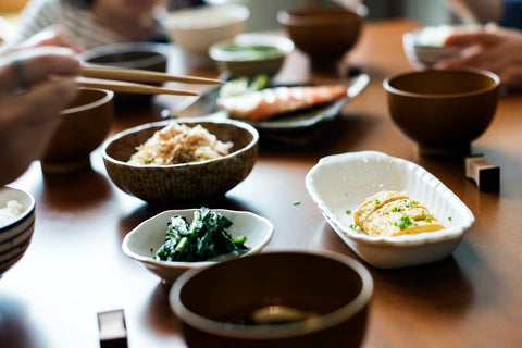 Historic spread of traditional Japanese food and tableware