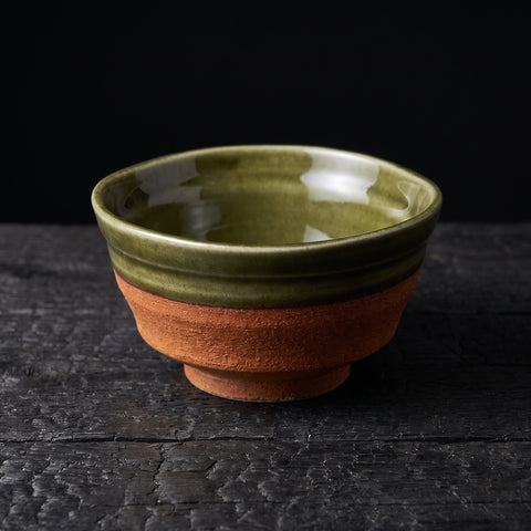 Olive-green Oribe glaze rounded bowl, rust-orange clay body
