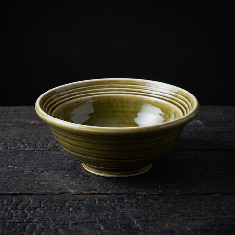Olive-green Oribe glaze round bowl with ring texture