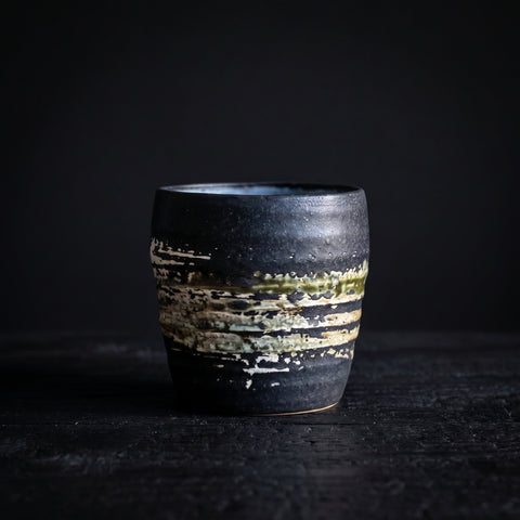 Japanese rustic ceramic cup in matte black, handleless tea and sake cup