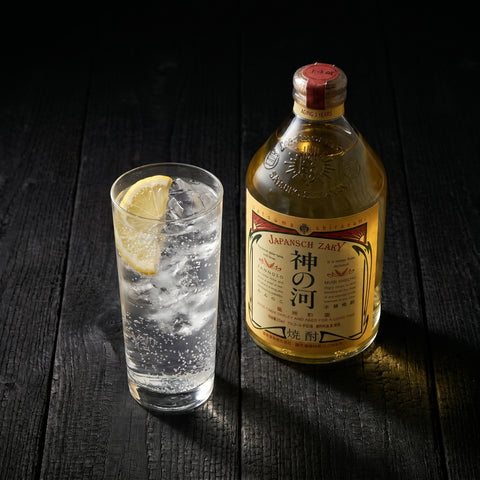 Close-up of Kannoko barley shochu amber spirit and label, 720ml bottle