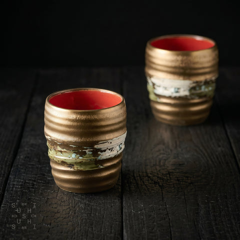 Gold-glaze rustic Japanese ceramic cup