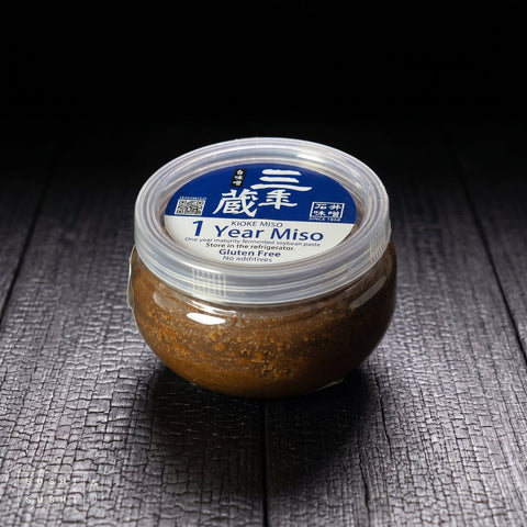 Ishiimiso, Sannengura One Year Miso, 300g, tub on charred wood