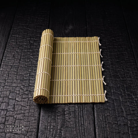 Japanese Sushi Rolling Mat, bamboo mat on charred wood