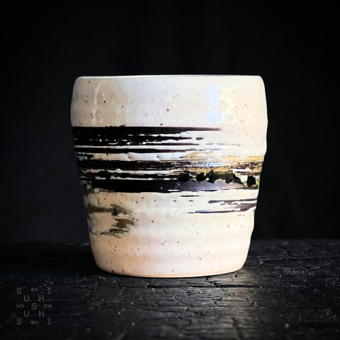 White rustic ceramic cup for green tea and sake