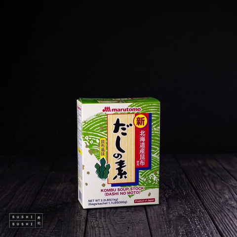Marutomo, Kombu Dashi Stock Powder (Dashi no Moto), 1kg, box on charred shou sugi ban wood