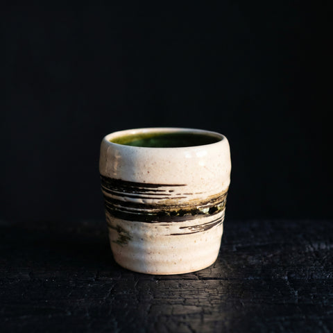 Japanese rustic ceramic cup in white-cream, handleless tea and sake cup