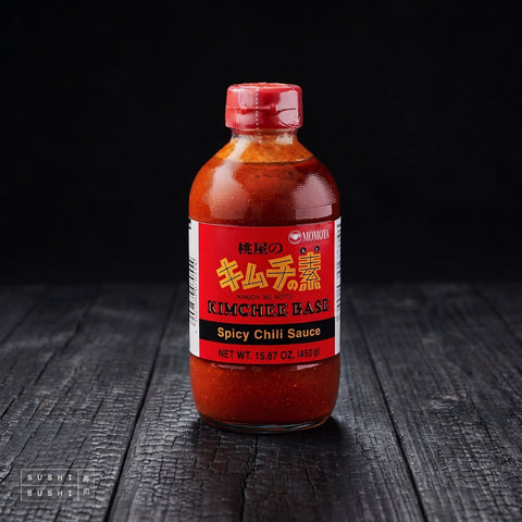 Momoya, Kimchi Sauce Concentrate, 450ml, bottle on charred wood