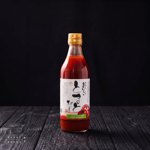 Nihon Shizen, Sweet Vinegar Tomato Dashi, 360ml, bottle on charred shou sugi ban wood against a black backdrop
