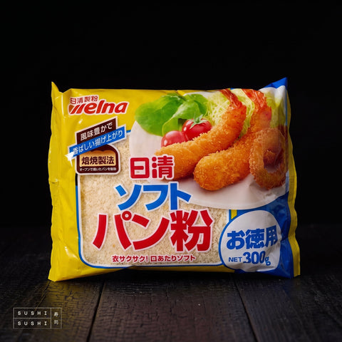 Nisshin Soft Japanese Panko 300g, bag on charred wood