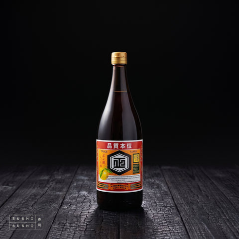 Shibanuma, Classic Yuzu Ponzu, 1.8L, bottle on a charred shou sugi ban wooden surface against a black background