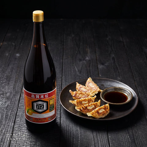 Shibanuma, Classic Yuzu Ponzu, 1.8L, beside pan-fried gyoza with a ponzu dip
