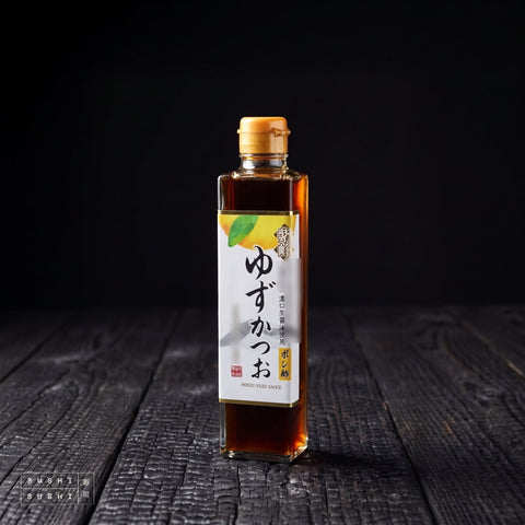 Shibanuma, Classic Yuzu Ponzu, 300ml, bottle on charred shou sugi ban wood against a black backdrop