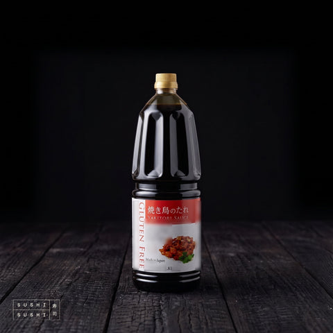 Shibanuma, Gluten Free Yakitori Sauce, 1.8L, bottle on charred shou sugi ban wood against a black backdrop