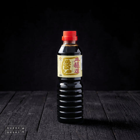 Shizuokake, Japanese Dark Soy Sauce, 500ml, bottle on charred shou sugi ban wood against a black background
