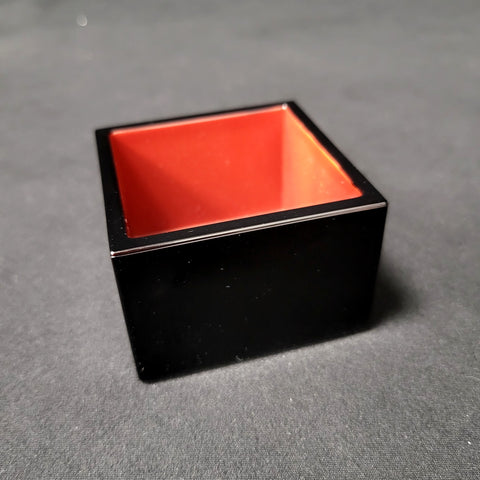Masu sake cup, side angle showing the glossy black exterior