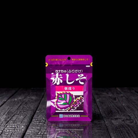 Tanaka, Red Shiso Powder, 22g, pouch on charred shou sugi ban wood against a black background