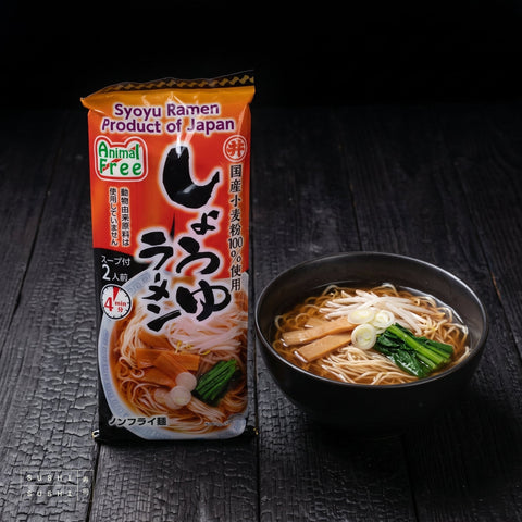 Toa, Shoyu Ramen Noodles (Vegan), 186g, beside a bowl of vegan shoyu ramen