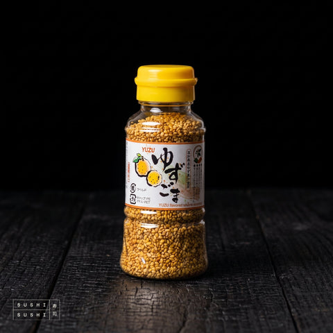 Toho, Sesame Seeds, Yuzu Flavour, 80g, shaker on charred wood