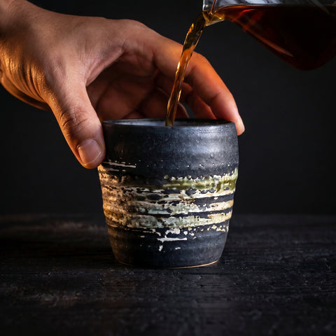 Matte black rustic cup with hand-painted white and green brush stroke