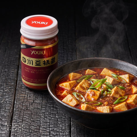 Youki, Tobanjan Chilli Bean Paste, 130g, beside a bowl of mapo tofu