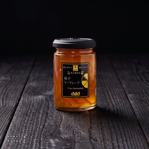 Yuzu Zest Marmalade, 160g, jar on charred wood